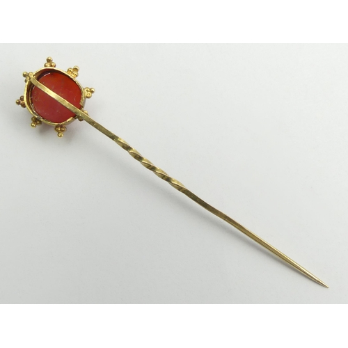 47 - Gold Victorian carved coral stick pin, 1.6 grams, 62mm wide. UK Postage £12.