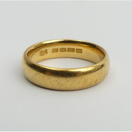 51 - 22ct gold wedding ring, London 1921, 7.8 grams, Size N, 5.1mm wide. UK Postage £12