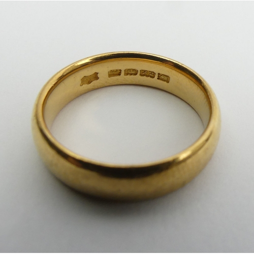 51 - 22ct gold wedding ring, London 1921, 7.8 grams, Size N, 5.1mm wide. UK Postage £12