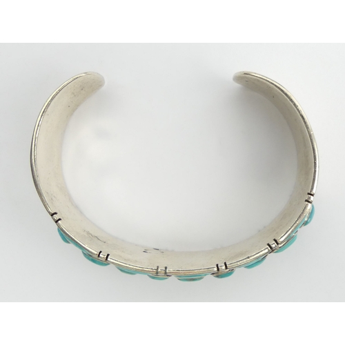 55 - Sterling silver and turquoise Native American cuff bangle, Buffalo head mark, 53.9 grams, 20mm wide.... 
