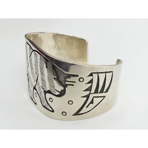 56 - Native American silver Bear design cuff bangle, 86.5 grams, Edinburgh 2001, 41mm wide. 
UK Postage £... 
