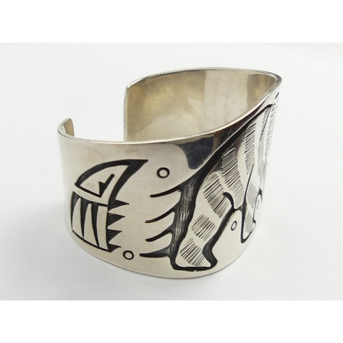 56 - Native American silver Bear design cuff bangle, 86.5 grams, Edinburgh 2001, 41mm wide. 
UK Postage £... 