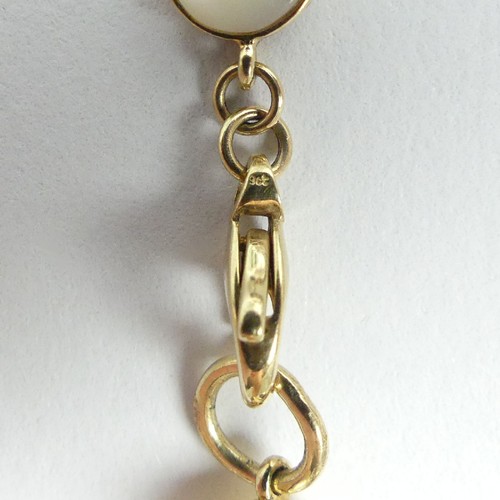 26 - 9ct gold lapis and moonstone cabochon bracelet, 10 grams, 17.5cm x 8.8mm. Postage £12