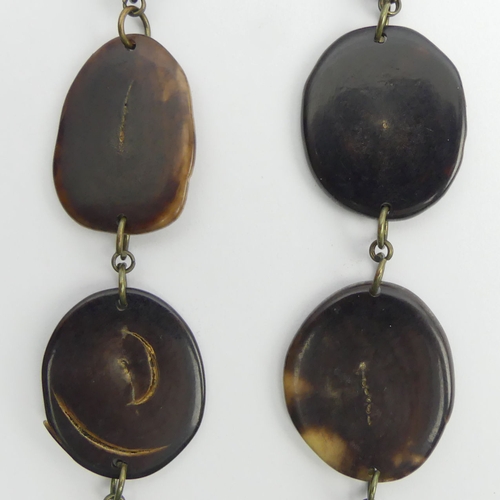 68 - 19th Century graduated Tortoiseshell oval disc necklace, 24 grams, 54cm. 
UK Postage £12.