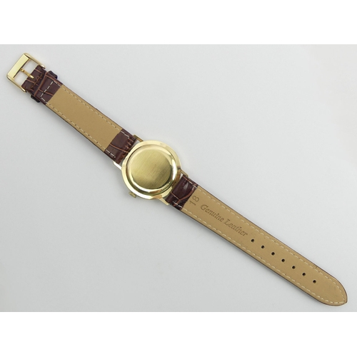 87 - Baume 14ct Gold manual wind Gents watch, 33mm, UK Postage £12 
Condition Report: In good working ord... 