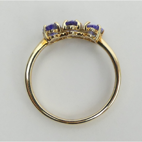 11 - 9ct gold three stone pear shape tanzanite ring, 1.6 grams, 6mm wide, Size N1/2. 
UK Postage £12