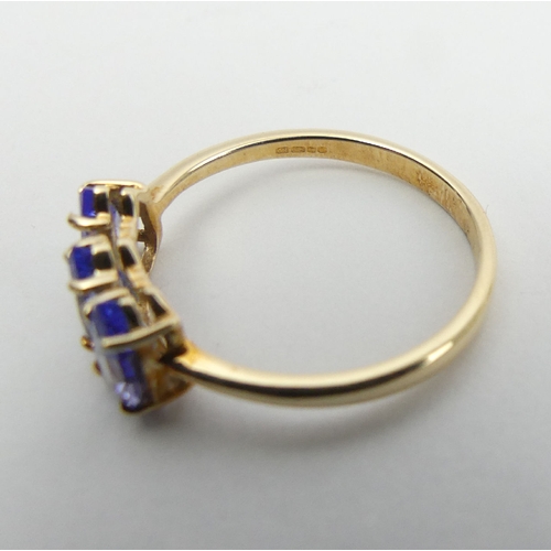 11 - 9ct gold three stone pear shape tanzanite ring, 1.6 grams, 6mm wide, Size N1/2. 
UK Postage £12