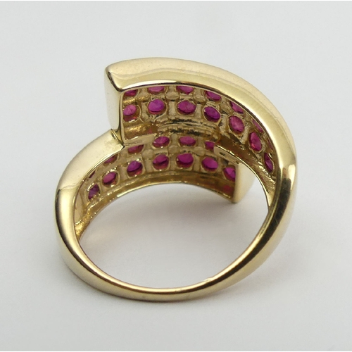 16 - 9ct gold ruby set ring, 5.6 grams, 14.7mm, 
Size N1/2. UK Postage £12