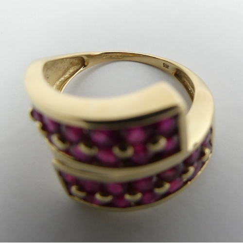 16 - 9ct gold ruby set ring, 5.6 grams, 14.7mm, 
Size N1/2. UK Postage £12