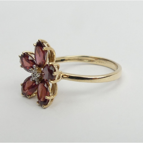 17 - 9ct gold rhodolite and diamond flower design ring, 2.6 grams, 14.5mm wide, Size N1/2    UK Postage £... 