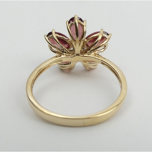 17 - 9ct gold rhodolite and diamond flower design ring, 2.6 grams, 14.5mm wide, Size N1/2    UK Postage £... 