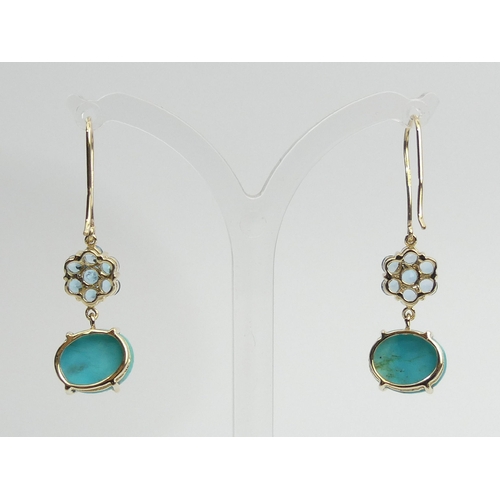 18 - A pair of 9ct gold blue topaz and turquoise drop earrings, 5.2 grams, 40mm long 
12mm wide. UK Posta... 