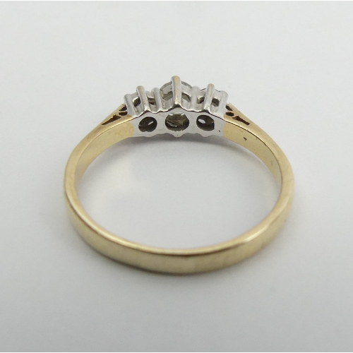 2 - 9ct gold three stone diamond ring (50 point total), 2 grams, 5.1mm wide. Size N 
UK Postage £12