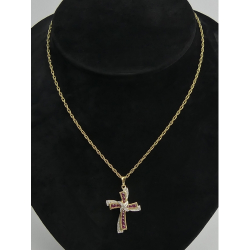 21 - 9ct gold ruby and diamond cross pendant & chain, 6.1 grams, Cross 35mm x 22mm. UK Postage £12.