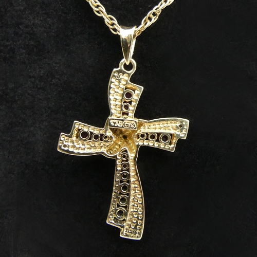 21 - 9ct gold ruby and diamond cross pendant & chain, 6.1 grams, Cross 35mm x 22mm. UK Postage £12.