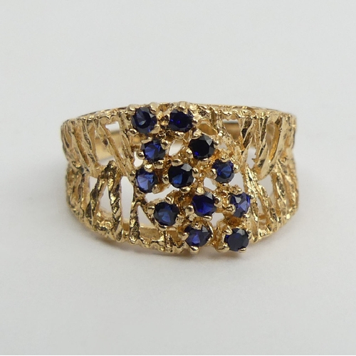 24 - 9ct gold sapphire ring, 3.5 grams, London 1971, 11.5mm wide, Size L1/2. UK Postage £12