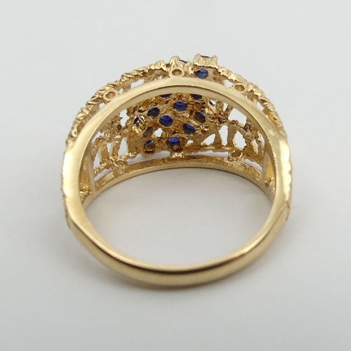 24 - 9ct gold sapphire ring, 3.5 grams, London 1971, 11.5mm wide, Size L1/2. UK Postage £12