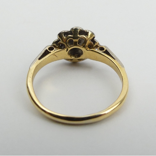 5 - 18ct gold diamond daisy design ring, 2.5 grams 9.2mm. Size I. UK Postage £12