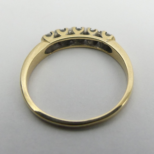 8 - 9ct gold five stone diamond ring, 1.3 grams, Size J, 2.8mm. UK Postage £12.