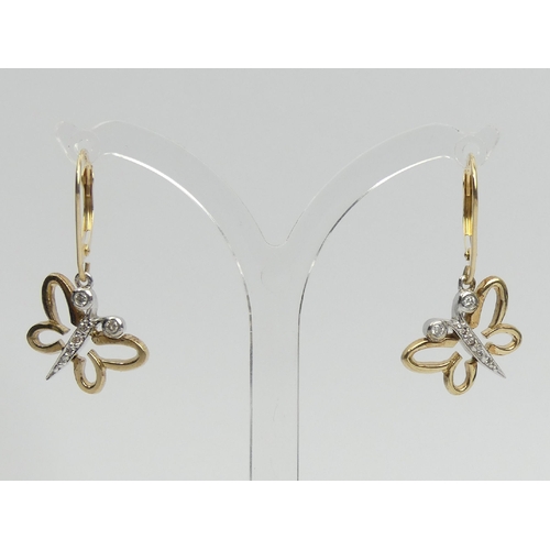 28 - A pair of 9ct gold diamond set butterfly design drop earrings, 2.7 grams. UK Postage £12.