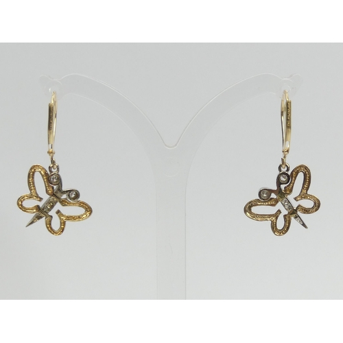 28 - A pair of 9ct gold diamond set butterfly design drop earrings, 2.7 grams. UK Postage £12.