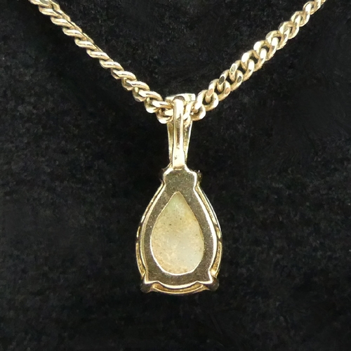 31 - 9ct gold pear shape opal pendant and chain, 3.5 grams, pendant 13mm. UK Postage £12.