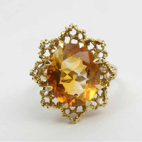 33 - 9ct gold citrine single stone ring, 4.6 grams, London 1970, 15mm wide, Size N. UK Postage £12.