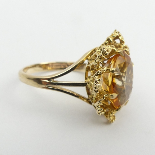 33 - 9ct gold citrine single stone ring, 4.6 grams, London 1970, 15mm wide, Size N. UK Postage £12.