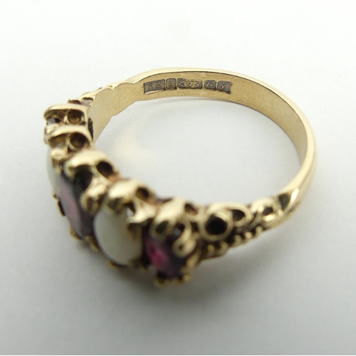 45 - 9ct gold opal and garnet ring, 4.1 grams, 8.5mm, Size Q1/2. UK Postage £12.