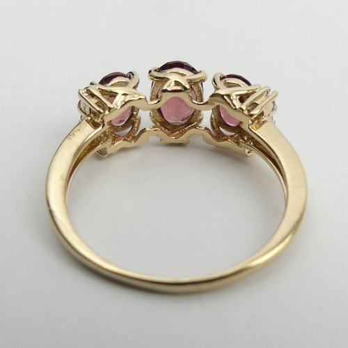 48 - 9ct gold rhodolite and diamond ring, 2.5 grams, 7.2mm, Size N1/2. UK Postage £12.