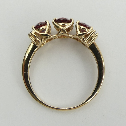 48 - 9ct gold rhodolite and diamond ring, 2.5 grams, 7.2mm, Size N1/2. UK Postage £12.