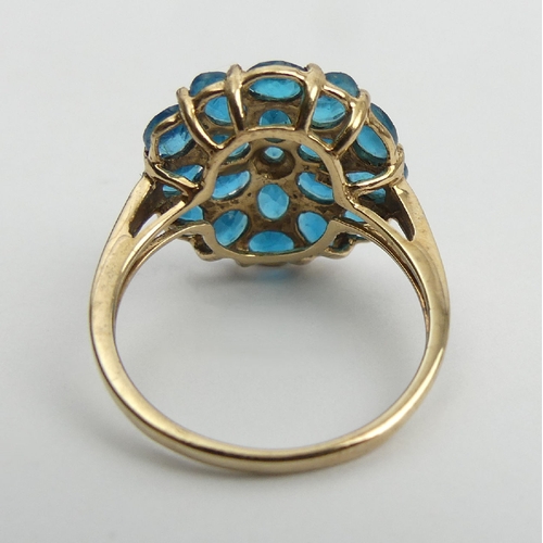 49 - 9ct gold neon apatite cluster ring, 3.4 grams, 16.7mm, Size N1/2. UK Postage £12.