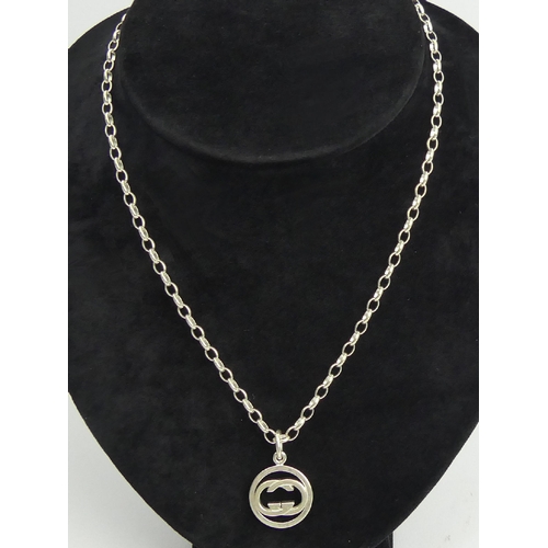 51 - Gucci sterling silver interlocking G pendant and chain, M.I.B. 14 grams. Chain 54cm, Pendant 28mm. U... 