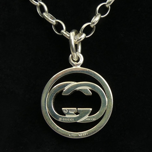 51 - Gucci sterling silver interlocking G pendant and chain, M.I.B. 14 grams. Chain 54cm, Pendant 28mm. U... 