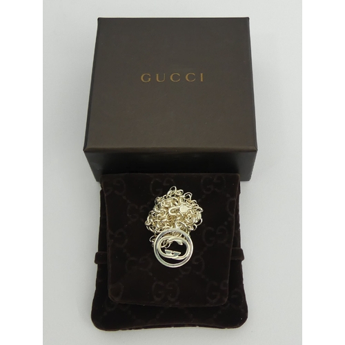 51 - Gucci sterling silver interlocking G pendant and chain, M.I.B. 14 grams. Chain 54cm, Pendant 28mm. U... 