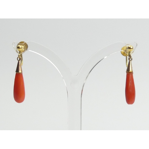 55 - A pair of 9ct gold coral drop earrings, 1.8 grams, 25mm long. UK Postage £12.