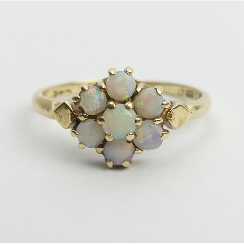 59 - 9ct gold opal cluster ring, 1.6 grams, 9.3mm wide, Size L. UK Postage £12.