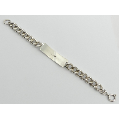 60 - Vintage sterling silver identity bracelet, 57.3 grams, London 1978, 21cm. UK Postage £12.