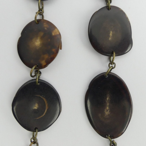 68 - 19th Century graduated Tortoiseshell oval disc necklace, 24 grams, 54cm. 
UK Postage £12.