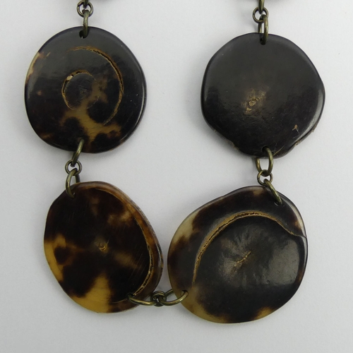 68 - 19th Century graduated Tortoiseshell oval disc necklace, 24 grams, 54cm. 
UK Postage £12.