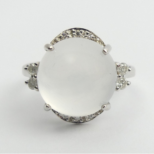 70 - 9ct white gold moonstone and diamond ring, 5.7 grams, 16mm UK Postage £12.