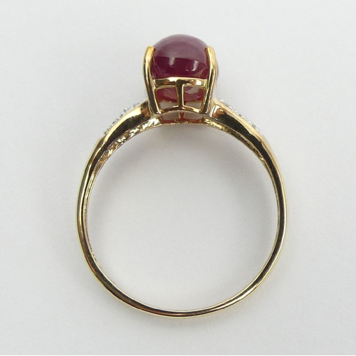 71 - 9ct gold star ruby and diamond ring, 2.2 grams, 9.1mm, Size N1/2. UK Postage £12.