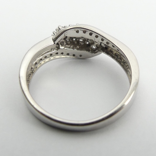 73 - Sterling silver and diamond ring, 2.6 grams, 8.5mm, Size N1/2. UK Postage £12.