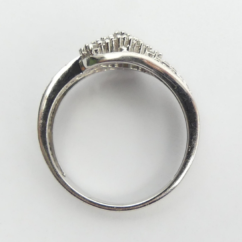 73 - Sterling silver and diamond ring, 2.6 grams, 8.5mm, Size N1/2. UK Postage £12.