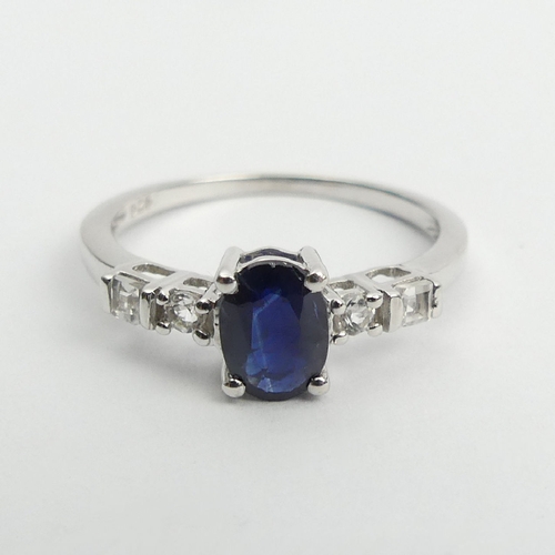 74 - Sterling silver sapphire and topaz ring, 1.5 grams, 6.8mm, Size N. UK Postage £12.