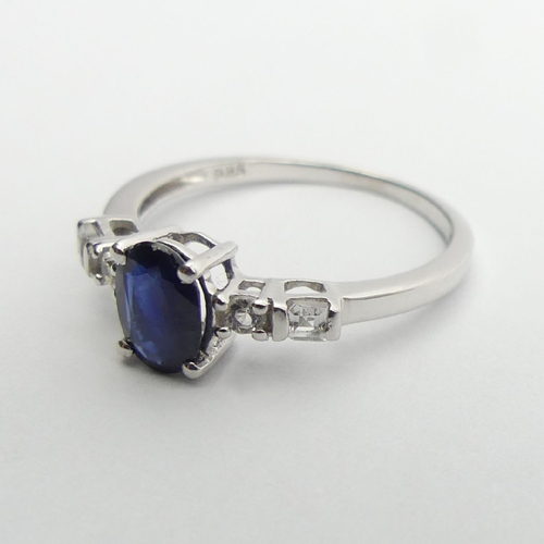 74 - Sterling silver sapphire and topaz ring, 1.5 grams, 6.8mm, Size N. UK Postage £12.