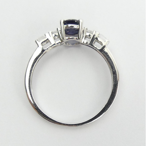 74 - Sterling silver sapphire and topaz ring, 1.5 grams, 6.8mm, Size N. UK Postage £12.