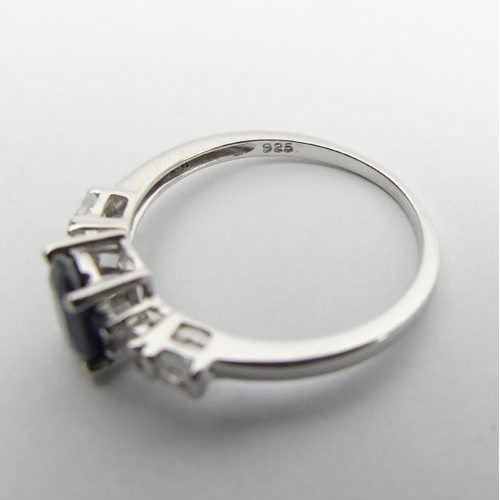 74 - Sterling silver sapphire and topaz ring, 1.5 grams, 6.8mm, Size N. UK Postage £12.