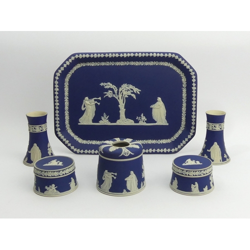 204 - Victorian Adams blue and white Jasperware dressing table tray, pots and candlesticks. Tray 30.5cm x ... 