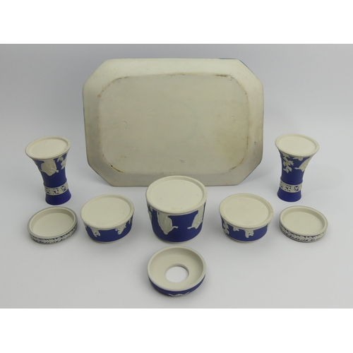 204 - Victorian Adams blue and white Jasperware dressing table tray, pots and candlesticks. Tray 30.5cm x ... 